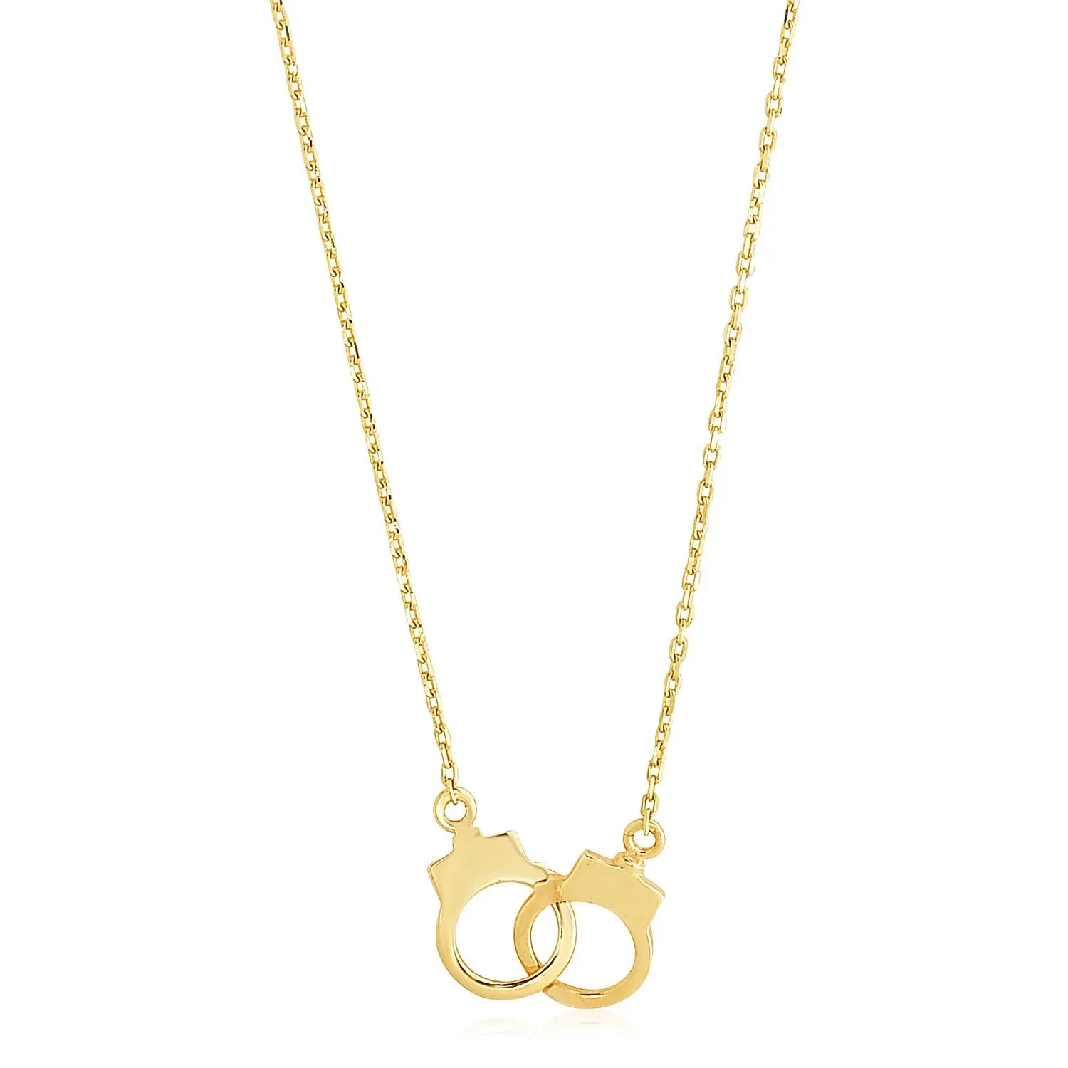 14k Yellow Gold High Polish Handcuff Necklace in a sleek high-contrast midnight luxury editorial style